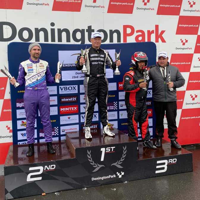 SVG Motor Sport driver Mark Lee on the winners podium